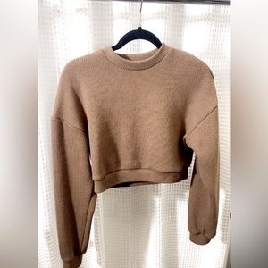 Size large, fits like a medium. Cool tone,neutral, cropped sweater. Thick & warm